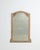 A 19th century French wall mirror crafted in oak, influenced by Art Nouveau design. The frame presents subtle shaping and...