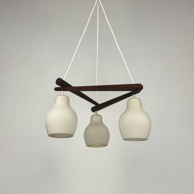 Mid-Century Modern Scandinavian Triangular Teak & White Glass Pendant Light, 1960s, in Very Good conditions. Designed 1960...