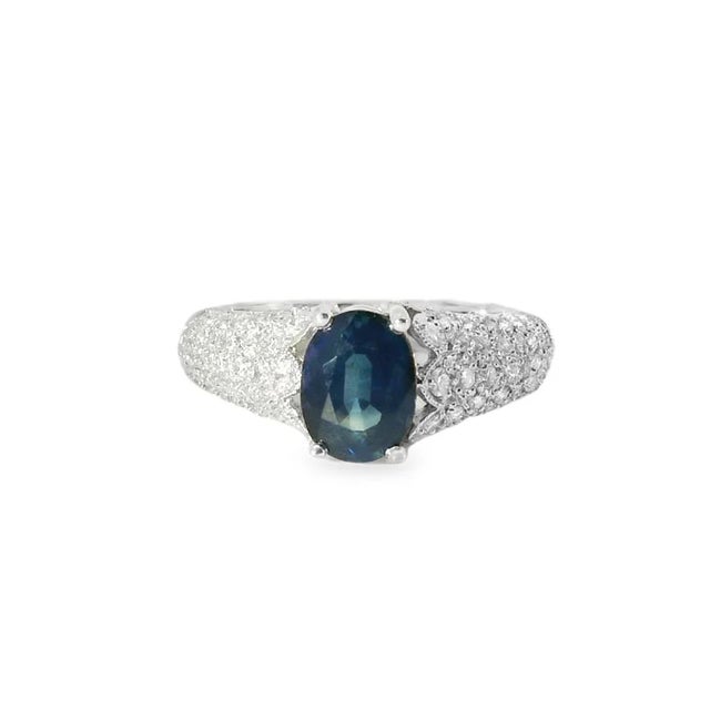 Elevate your jewelry collection with this elegant 14K White Gold Sapphire Diamond Tulip Ring. Featuring a natural oval...