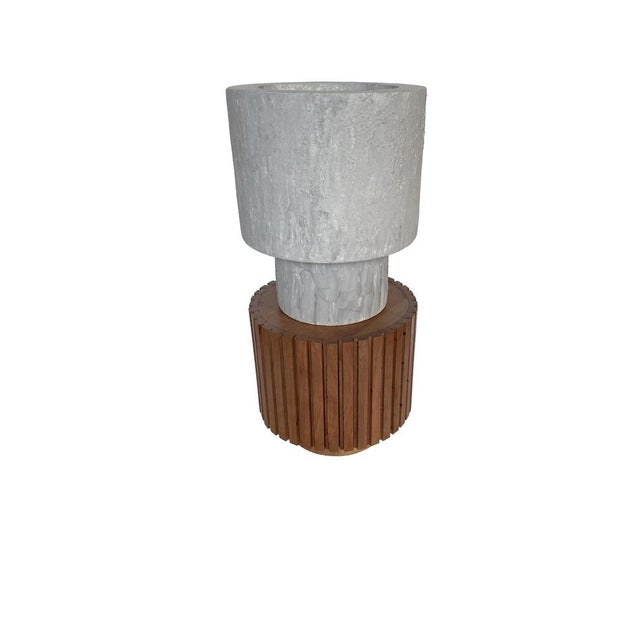 Totem Lamp Cinque, designed in 2020 by Meccani Studio, is part of a collection of 18 table and floor lamps. The lamp is...