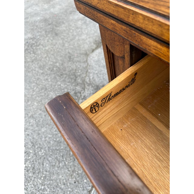 Vintage bar cabinet by Thomasville. High quality and heavy made. This cabinet has a top that flips open to reveal a...