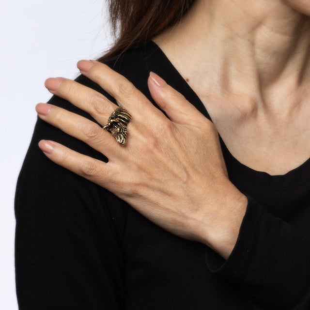 Distinct & stylish vintage zebra ring (circa 1960s to 1970s) crafted in 14 karat yellow gold. Two small black stones are...