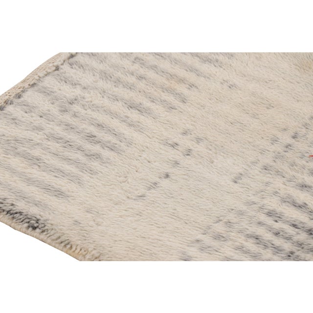 Made with hand-knotted wool and originating from Morocco, this 3x4 Moroccan rug by Rug & Kilim represents an exciting new...