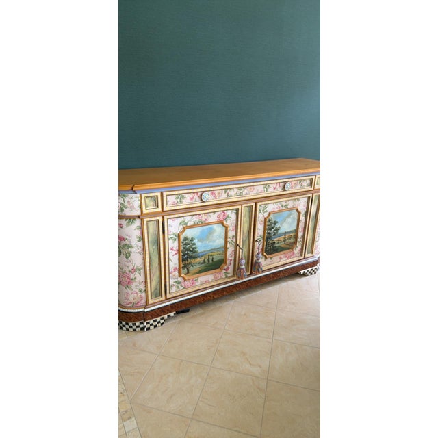 This stunning McKenzie‑Childs buffet is a true statement piece, blending artistry and craftsmanship in every detail. The...