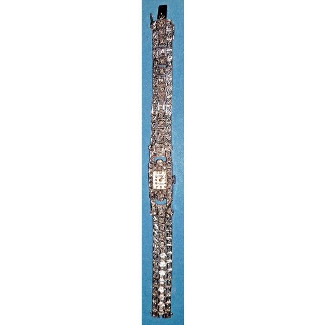 Metal Type: 900 Platinum Length: 6.75 inches Width: 12.7mm Weight: 29.0 grams w/o movement, approx 28g of 90% platinum...