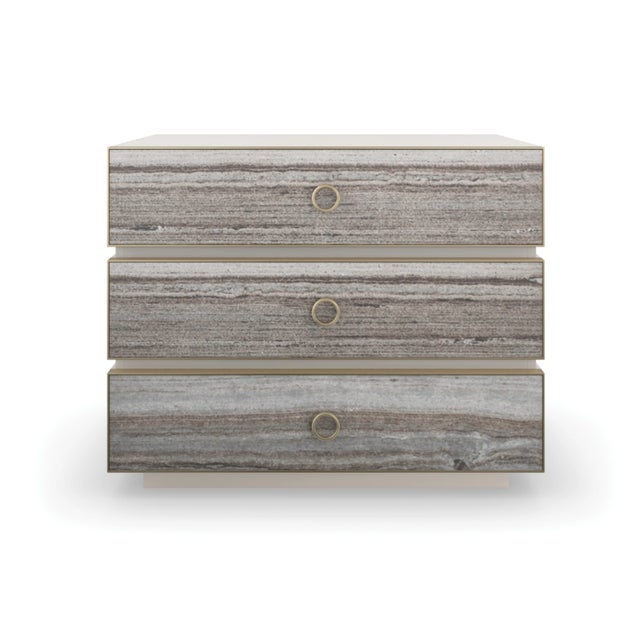 The Bedrock Nightstand brings a refined blend of natural texture and modern elegance to the bedroom. Featuring polished...