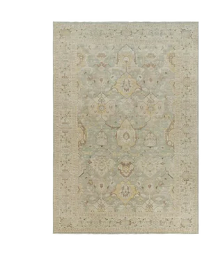 Rug & Kilim’s Oversized Shield Rug in Pale Green With Floral Medallions