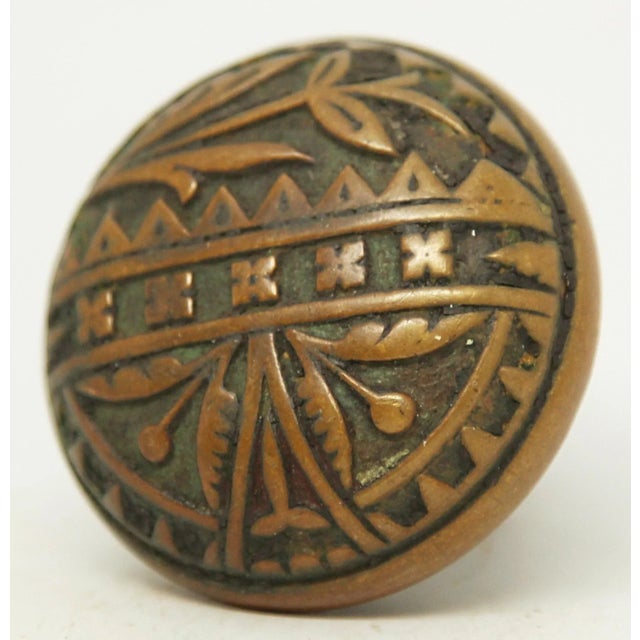 This Vernacular style bronze passage door knob was made by Britten Graham & Mathess in the 1880 catalog. It belongs to the...