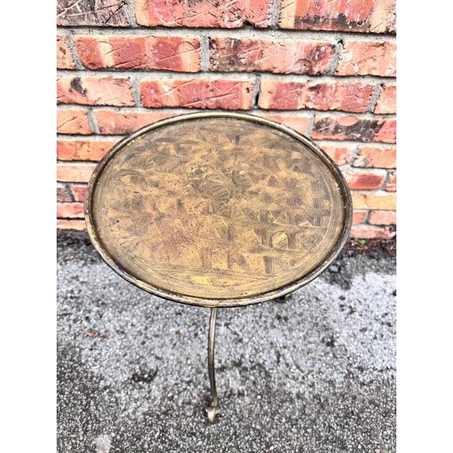 This is wonderful little Spanish made wrought iron drink table with an antiqued gold finish. Contemporary yet antique...