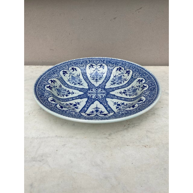 19th century French blue and white faience soup plate signed "Francois" Sarreguemines.