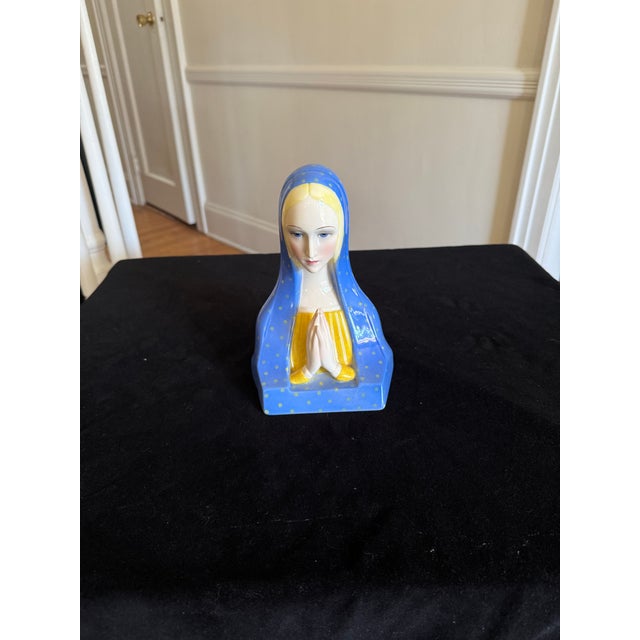 A magnificent, hand-decorated ceramic sculpture of the Madonna. Made by Lenci of Turin, Italy, it is signed under the base...