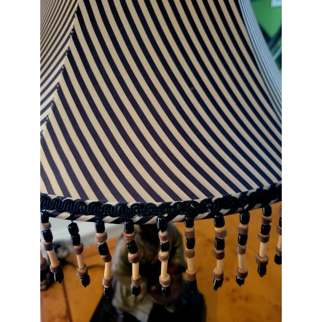 1980s Vintage Regency Monkey Playing a Drum With Gold Robe, Hat Table Lamp Striped Black Gold Shade For Sale - Image 5 of 11