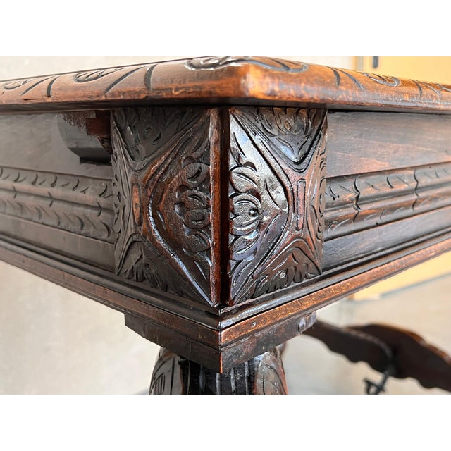 In grand, gothic style, this Spanish library / writing table has a deeply carved edge and this is just the tip of the...