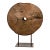 An ancient Indian cart wheel mounted on custom black lacquered base, with brown patina. Imagine the rhythmic creak of...