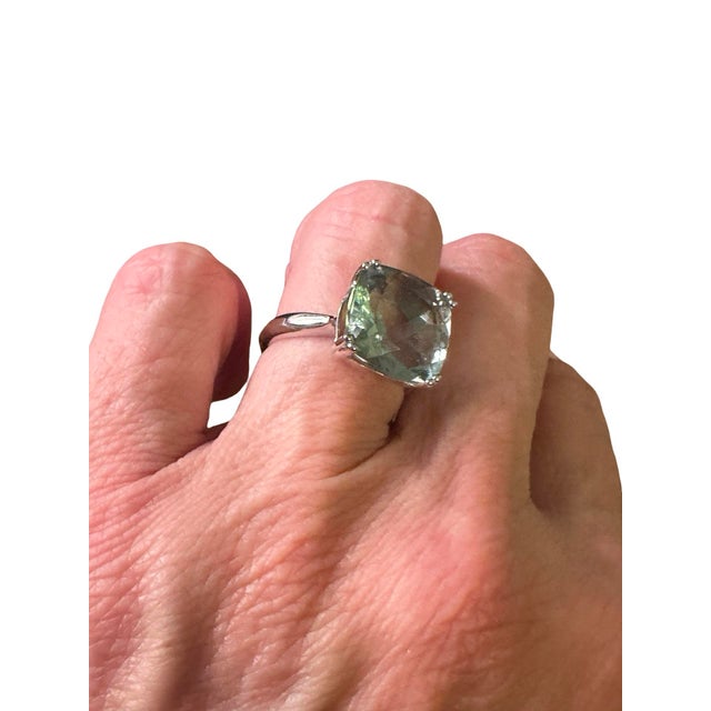 Subtle and striking Prasiolite gemstone set in sterling silver. The color is a soft green, faceted stone, and measures...