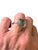 Subtle and striking Prasiolite gemstone set in sterling silver. The color is a soft green, faceted stone, and measures...