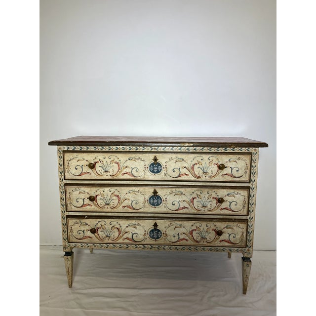19C Painted Italian Commode. An Italian Polychrome Faux-Marble Top Neoclassic Commode 19th Century The faux-marble top...