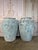 An exceptional pair of large-scale antique terracotta storage jars, distinguished by their beautifully aged surfaces and...
