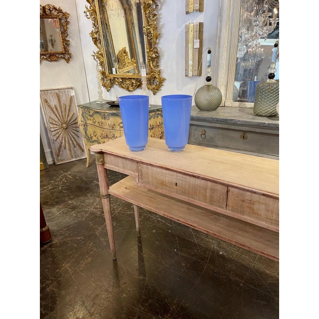Very nice pair of vintage periwinkle blue Murano glass vases. A beautiful accessory that would make an excellent gift!