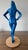 This is a polyurethane resin sculpture painted with polyurethane paint, mounted on a wooden base. It measures...