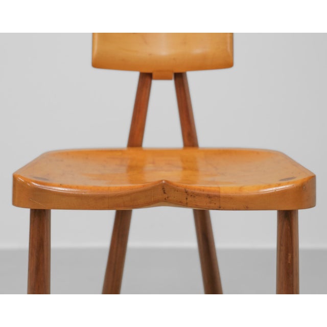 A stylish Postmodern walnut & maple desk chair. Circa 1980s. Wonderfully crafted in solid walnut and maple, the chair...
