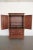 Vintage American Drew armoire from the iconic Cherry Grove collection, dating from the late 1980s to 1990s. Crafted in...