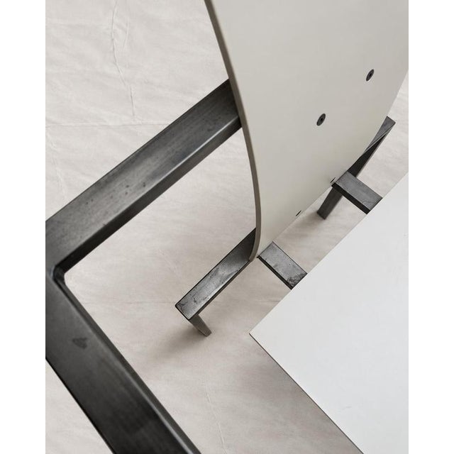 A german postmodern industrial armchair attributed to karl-friedrich förster for kff design, dating to circa 1980s. The...