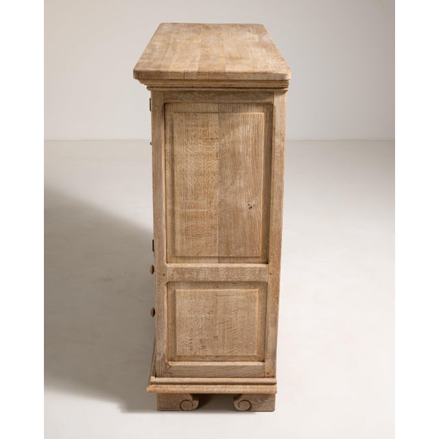 Rendered in richly grained French oak, this striking buffet from the 1970s embodies the Brutalist aesthetic at its most...