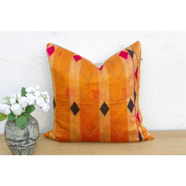 This 20-inch square pillow is a luminous masterpiece of Museum-Grade Phulkari, repurposed from a rare 19th-century...