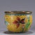 This vibrant vintage bowl is a beautiful example of traditional cloisonné enamel craftsmanship. The piece features a...