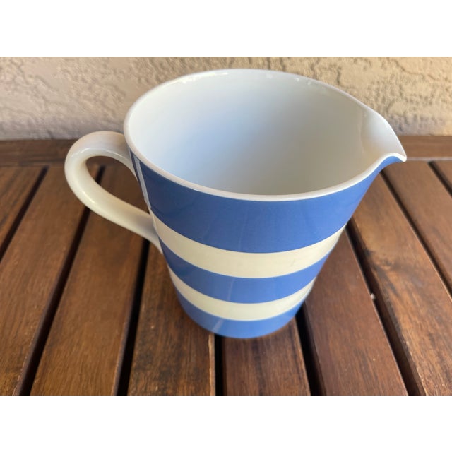 This item is a vintage T.G. Green Cornishware milk jug featuring the iconic blue and white horizontal stripes and "MILK"...