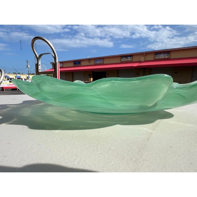 This gorgeous Large Recycled Glass Bowl. The bowl features a unique swirl pattern in green and white, perfect for all...