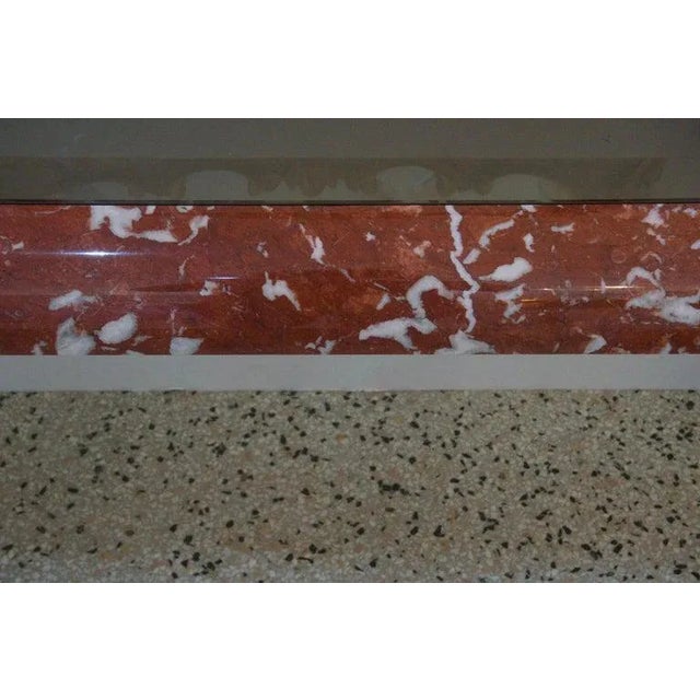 This stylish and chic breccia marble console table dates to the 1980s and is very much in the manner of piece created by...