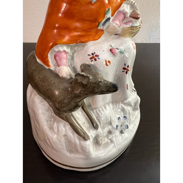 Antique English Staffordshire Woman With Basket and Dog Figure Circa 1860's Made in England, circa 1860's Cold painted...