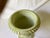 Vintage terracotta urn brings elegance to any setting with graceful curves, pedestal base and soft green color. It is a...