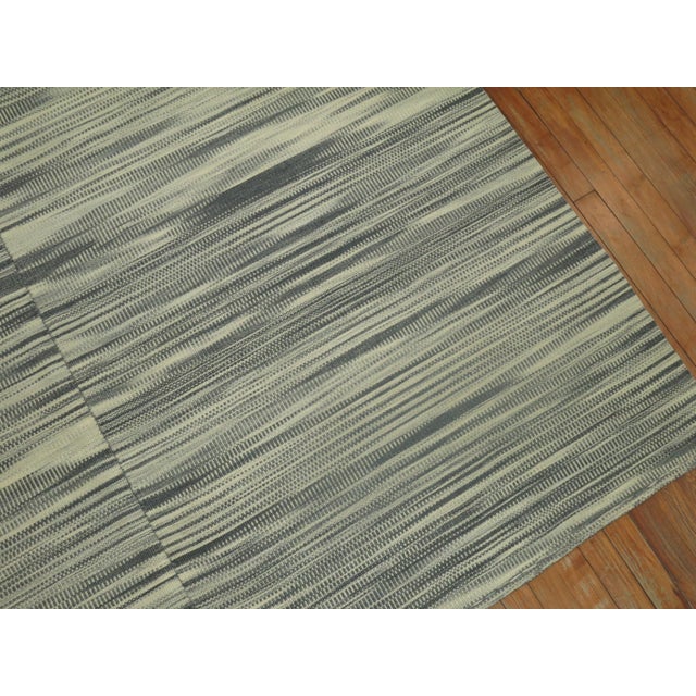 A one-of-a-kind Modern Turkish Kilim. Measures: 6'10'' x 10.