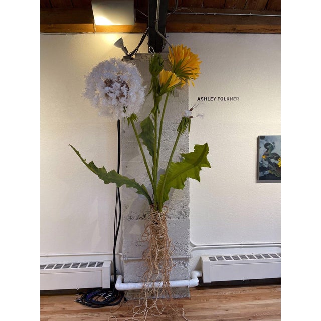 Roots and Wings by Ashley Folkner | Mixed Media Artwork of flowers and roots on a wall. For Sale