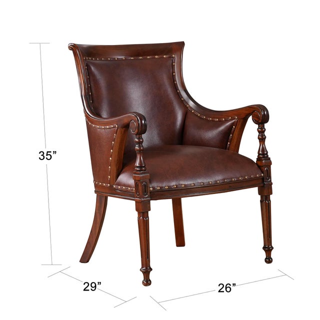 The Niagara Furniture Leather Regency Chair is upholstered using only genuine full gran leather and accented with brass...