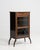 A distinguished example of Edwardian craftsmanship, this vitrine cabinet from the United Kingdom embodies the refined...