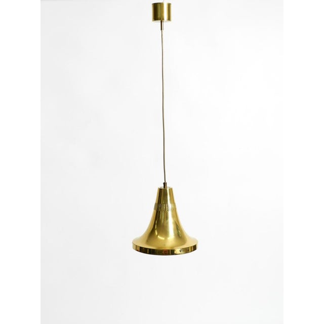Original 1960s hans-agne jakobsson brass pendant lamp by markaryd. Made in sweden. the shade and canopy are crafted from...