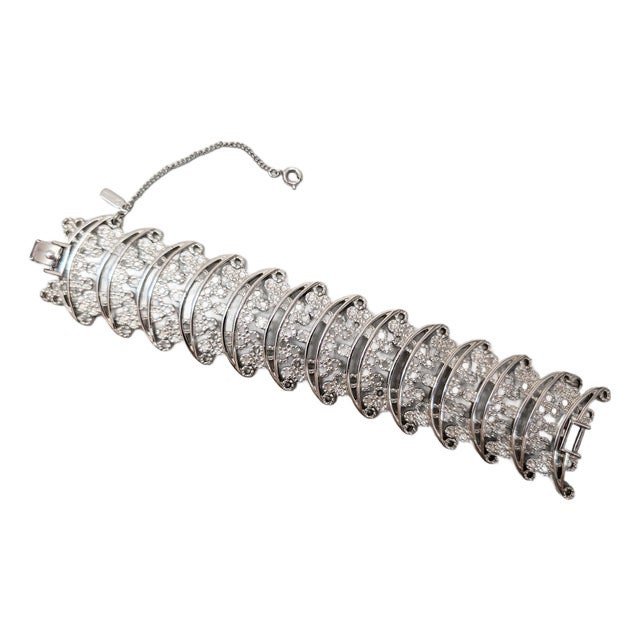 Vintage 1973 Signed Monet Rhodium Plated Openwork Link Primavera Bracelet For Sale