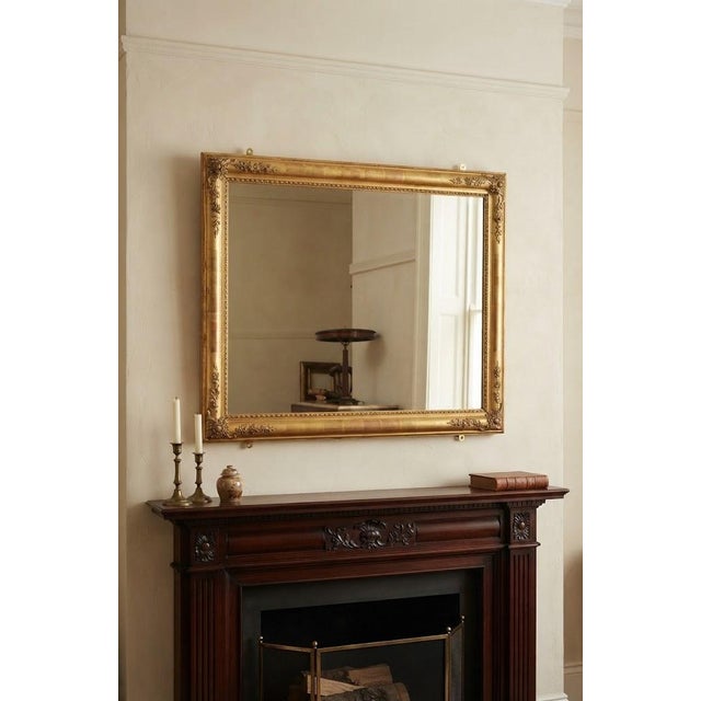 An elegant late 19th-century french giltwood wall mirror with versatile dual-orientation hanging, circa 1880. This...