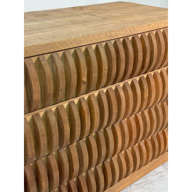 This sculptural cabinet was designed by Mario Ceroli and executed in solid pinewood, a material he favored for its warmth,...