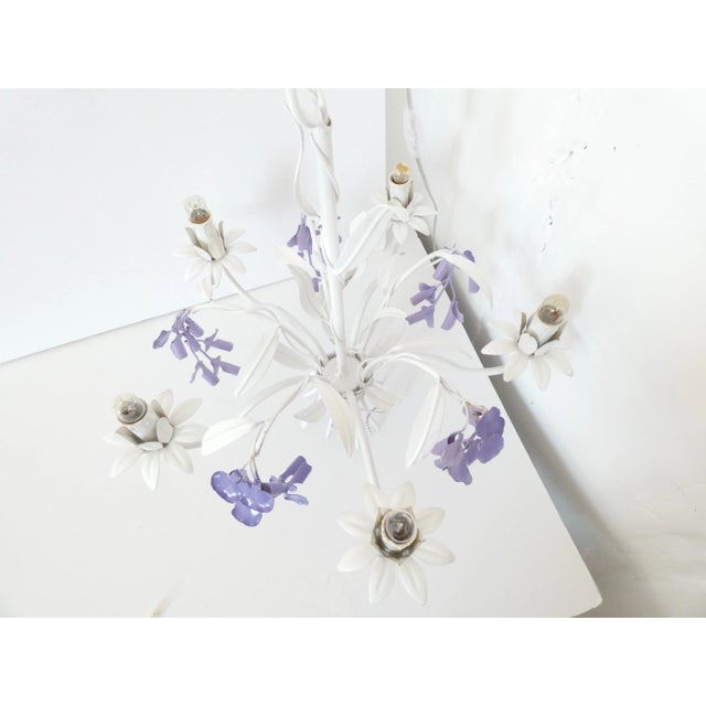 5 armed functional french tole chandelier with lavender wisteria flowers and ribbon on the bottom. This is a functional...