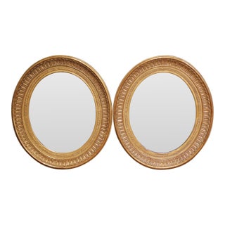 Pair of 19th Century French Louis XVI Oval Giltwood Wall Mirrors For Sale