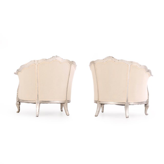 A Pair of French Louis XV Style Silver Leaf Lounge Chairs, C. 1930. For Sale - Image 4 of 6