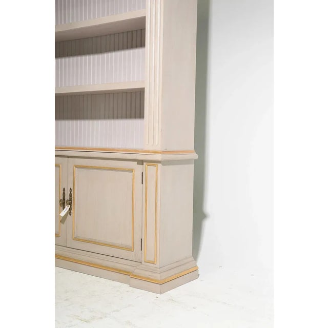 Make a grand statement with this stunning oversized French-inspired bibliothèque, beautifully crafted with elegant...