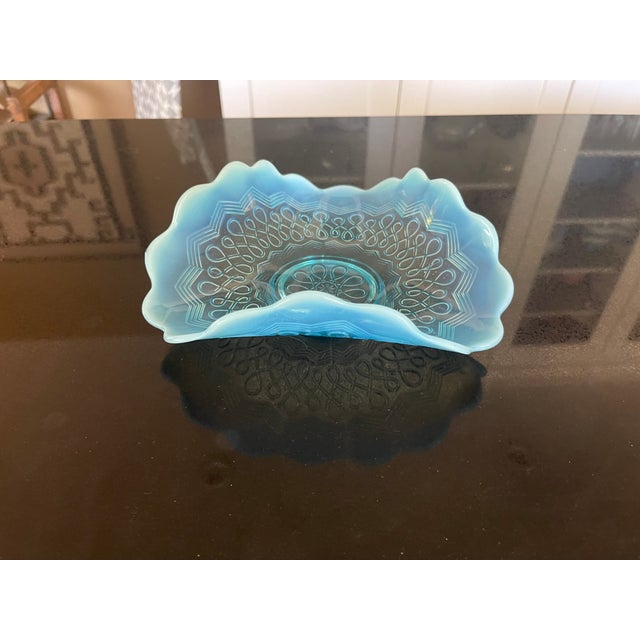 Here is a Jefferson Glass Tri-Fold pattern Many Loops. It is a beautiful blue opalescent bowl. No cracks or chips....
