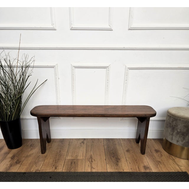 Beautiful Italian rustic primitive country wooden bench, with trestle style legs in original aged natural color giving the...