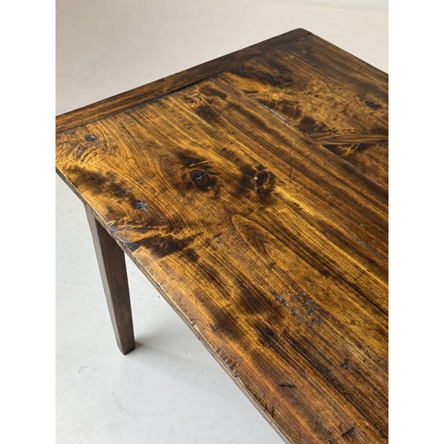 French farmhouse dining table. Originally from france, early 19th century. Very beautiful color. Tapered legs. Wide drawer...